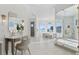 Spa-like bathroom with a large shower, soaking tub, and vanity at 96 Martinique Ave, Tampa, FL 33606