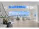 Bright living room with water views and high ceilings at 96 Martinique Ave, Tampa, FL 33606