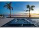 Luxury pool and spa with sunset view at 96 Martinique Ave, Tampa, FL 33606