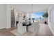 Spacious dining room with water views and wine storage at 96 Martinique Ave, Tampa, FL 33606