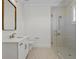 Elegant bathroom with a large walk-in shower and modern vanity at 96 Martinique Ave, Tampa, FL 33606