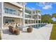 Luxury home with expansive backyard, pool, and outdoor seating area at 96 Martinique Ave, Tampa, FL 33606