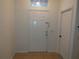 Light and airy entryway with tiled floor and white doors at 10319 Avelar Ridge Dr, Riverview, FL 33578