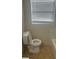 Bathroom featuring new shower/tub combo with new flooring at 1006 39Th W Ave, Bradenton, FL 34205