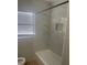New bathroom featuring new tile, toilet and shower/tub combo at 1006 39Th W Ave, Bradenton, FL 34205