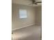 A bedroom featuring tiled floors and a window with blinds at 1006 39Th W Ave, Bradenton, FL 34205
