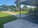 View of the driveway and front lawn with well-maintained landscaping, offering curb appeal at 1006 39Th W Ave, Bradenton, FL 34205