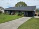 Charming single-story home features a well-maintained lawn and inviting curb appeal at 1006 39Th W Ave, Bradenton, FL 34205