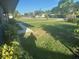 View of front lawn and shrubs at 1006 39Th W Ave, Bradenton, FL 34205