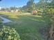 View of front lawn and shrubs at 1006 39Th W Ave, Bradenton, FL 34205