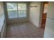 This room boasts tiled floors and natural light from the windows, creating a cozy and welcoming atmosphere at 1006 39Th W Ave, Bradenton, FL 34205