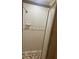 The shower features tiled walls and mosaic tiled floor at 1006 39Th W Ave, Bradenton, FL 34205