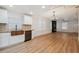 Open concept kitchen and living room with modern finishes at 3810 N Arlington Ave, Tampa, FL 33603