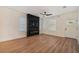 Living room featuring a modern fireplace and built-in TV at 3810 N Arlington Ave, Tampa, FL 33603
