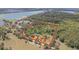 Aerial view showcasing a tree-filled property with a defined boundary on Kenton Road near Elam Road at 8529 Kenton Rd, Wesley Chapel, FL 33545