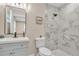 Clean bathroom with marble shower and modern vanity at 3721 Wiggins Leaf St, Tampa, FL 33619