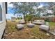 Backyard with fire pit and seating area at 3721 Wiggins Leaf St, Tampa, FL 33619