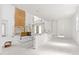 Bright, open-concept living room is under construction with modern minimalist design at 4805 W San Rafael St, Tampa, FL 33629