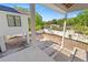 View of backyard and pool construction from patio with modern design, perfect for outdoor relaxation at 4805 W San Rafael St, Tampa, FL 33629