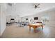 Community game room features pool table, ping pong, and seating at 8251 Brent St # 912, Port Richey, FL 34668