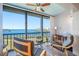 Relaxing sunroom with stunning water views and ample natural light at 8251 Brent St # 912, Port Richey, FL 34668