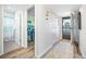 Condo hallway with bathroom and bedroom doors visible at 8251 Brent St # 912, Port Richey, FL 34668
