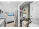 Convenient laundry area with washer, dryer, and water softener at 8251 Brent St # 912, Port Richey, FL 34668