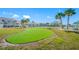 Enjoy a game of putting on the community's putting green at 8251 Brent St # 912, Port Richey, FL 34668