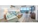 Bright living room with water views and comfortable seating at 8251 Brent St # 912, Port Richey, FL 34668