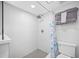 Bathroom with walk-in shower and tile surround at 8251 Brent St # 912, Port Richey, FL 34668
