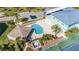 Relaxing kidney-shaped pool with shaded seating area at 8251 Brent St # 912, Port Richey, FL 34668