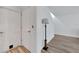 Bright hallway with doors and flooring at 12950 Fennway Ridge Dr, Riverview, FL 33579