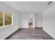 Spacious bedroom with wood-look floors and an ensuite bathroom at 12950 Fennway Ridge Dr, Riverview, FL 33579