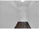 Large closet with wire shelving and dark wood flooring at 12950 Fennway Ridge Dr, Riverview, FL 33579