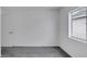 Simple bedroom with grey carpet and a window at 12950 Fennway Ridge Dr, Riverview, FL 33579