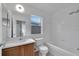 Clean bathroom with a bathtub, toilet and vanity at 12950 Fennway Ridge Dr, Riverview, FL 33579