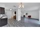 Open concept kitchen with view to living and dining areas at 12950 Fennway Ridge Dr, Riverview, FL 33579