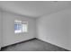 Spacious bedroom with grey carpet and a window at 12950 Fennway Ridge Dr, Riverview, FL 33579