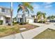 Two-story house with light blue exterior and a white garage door at 12950 Fennway Ridge Dr, Riverview, FL 33579