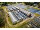 Aerial view of a large farm with greenhouses at 10521 County Road 579, Thonotosassa, FL 33592