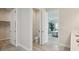 Bathroom layout showcasing the toilet, vanity and entrance to the bedroom at 17721 Roost Pl, Lakewood Ranch, FL 34211