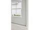 Window view with white trim and neutral walls at 17721 Roost Pl, Lakewood Ranch, FL 34211