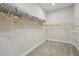 Walk-in closet with carpeted floor and shelving at 17721 Roost Pl, Lakewood Ranch, FL 34211