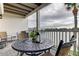 Charming balcony with stylish seating and a serene waterfront view for relaxing outdoors at 12246 2Nd E St # 503, Treasure Island, FL 33706