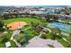 Aerial view of the community park featuring a playground, baseball field, tennis courts and more at 12246 2Nd E St # 503, Treasure Island, FL 33706