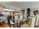 Bright dining area adjacent to open kitchen and staircase, bathed in natural light at 12246 2Nd E St # 503, Treasure Island, FL 33706