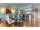 Open dining area with tiled floors, modern lighting, and a stylish table set at 12246 2Nd E St # 503, Treasure Island, FL 33706