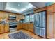 Updated kitchen features stainless steel appliances, ample cabinet space, and terra cotta tile flooring at 12246 2Nd E St # 503, Treasure Island, FL 33706