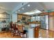 Spacious kitchen featuring a granite island, stainless steel appliances, and ample cabinet space at 12246 2Nd E St # 503, Treasure Island, FL 33706