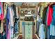 Spacious walk-in closet providing ample storage with custom shelving and drawers for organization at 12246 2Nd E St # 503, Treasure Island, FL 33706